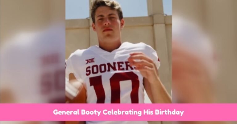 General Booty smiling on his birthday during a football event.